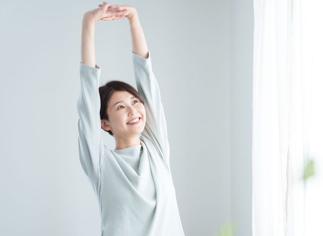 Woman stretching in the morning