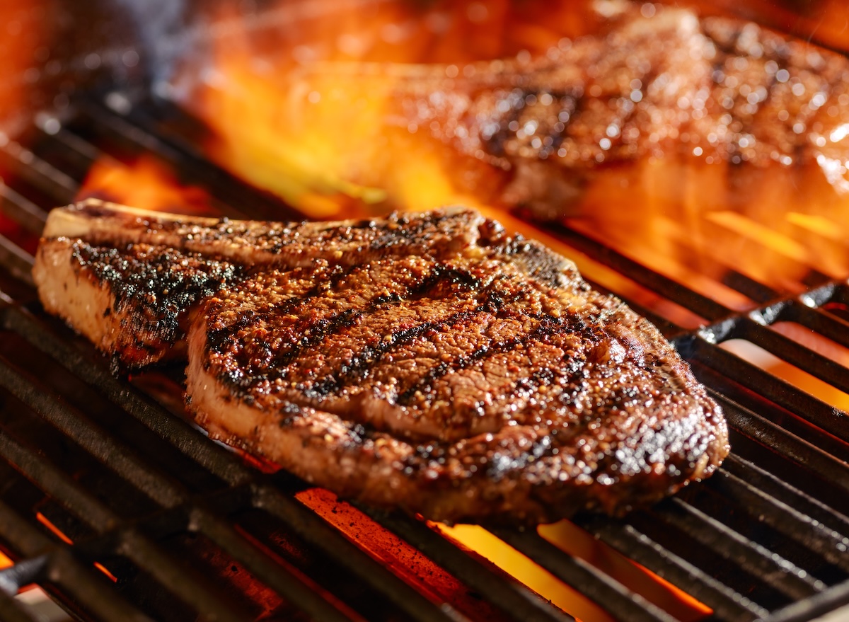 Ribeye,Steaks,On,The,Grill,Over,The,Open,Flame