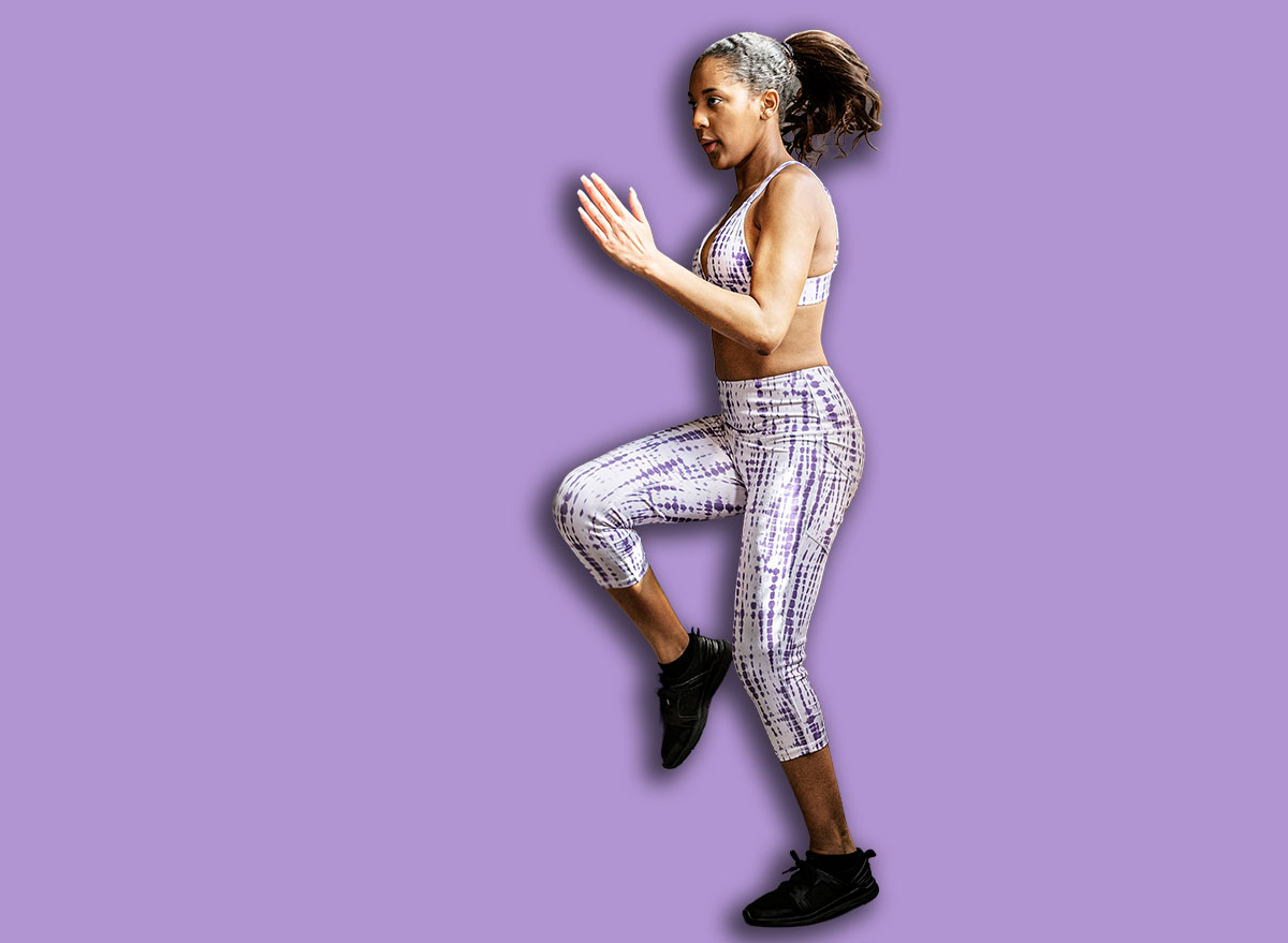 Sportive woman doing a high knees