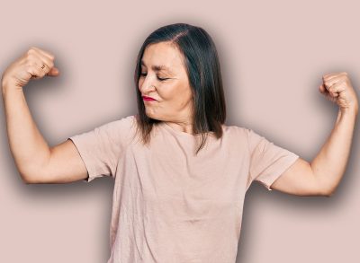 Middle age hispanic woman wearing casual clothes showing arms muscles smiling proud. fitness concept.