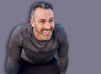 Mature, man and happy for workout break with fitness fatigue, overworked and tired of running challenge. Space, athlete and rest at promenade with exercise burnout, endurance and recovery from cardio