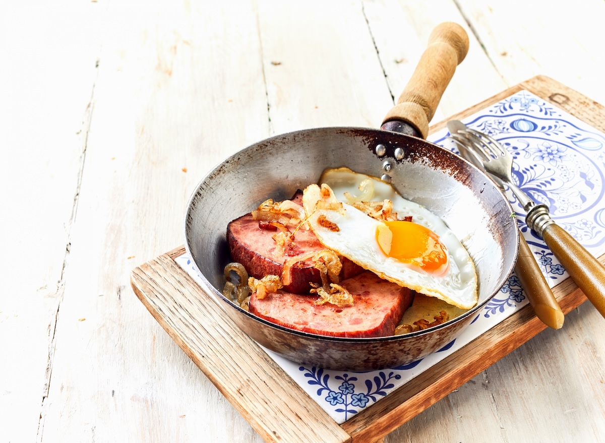 Worn,Skillet,With,Serving,Of,German,Breakfast,With,Fried,Egg