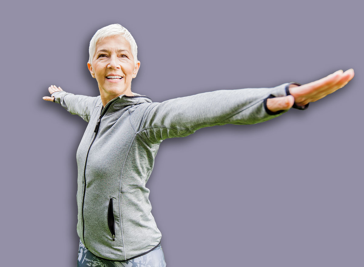 Portrait Of Healthy Fit Senior Woman Doing Fitness Exercise In Nature, Workout Outdoor.