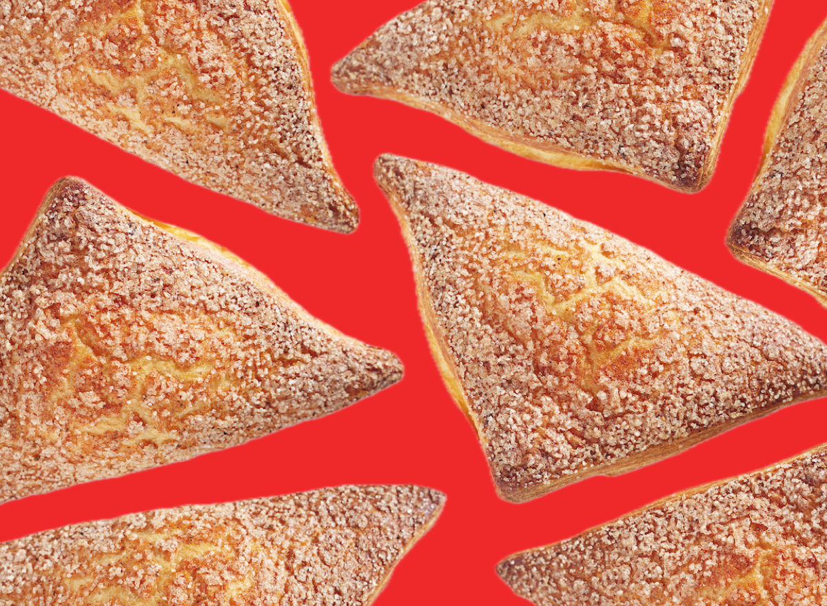 Apple turnovers fried dessert red background