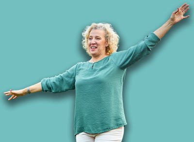 Happy active mid aged adult couple having fun walking and balancing and bonding in park or nature outdoors, healhty active mature people exercise concept