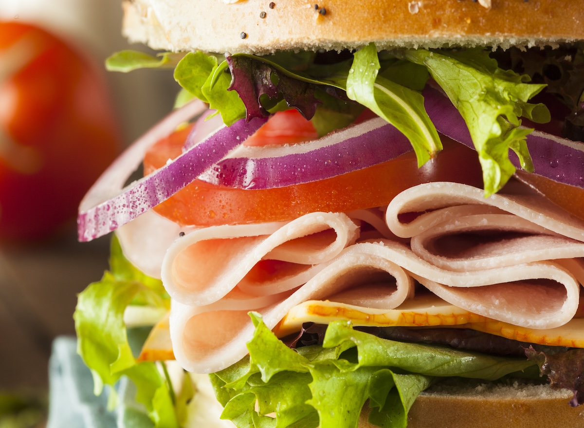 Healthy,Turkey,Sandwich,On,A,Bagel,With,Lettuce,And,Tomato