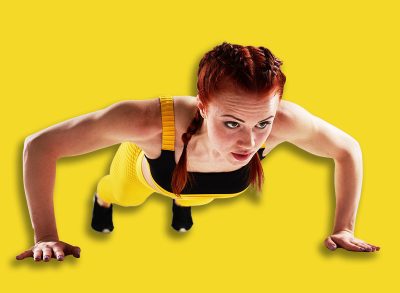strong woman doing push-ups