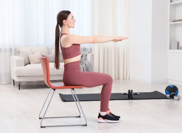 Beautiful woman lying on a chair at home