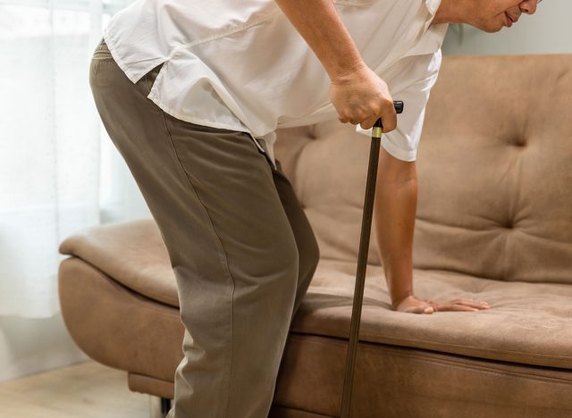 Caregiver takecare older man that having Sarcopenia or muscle loss. Sarcopenia is a degenerative disease of the muscle usually caused by the natural consequence of aging.