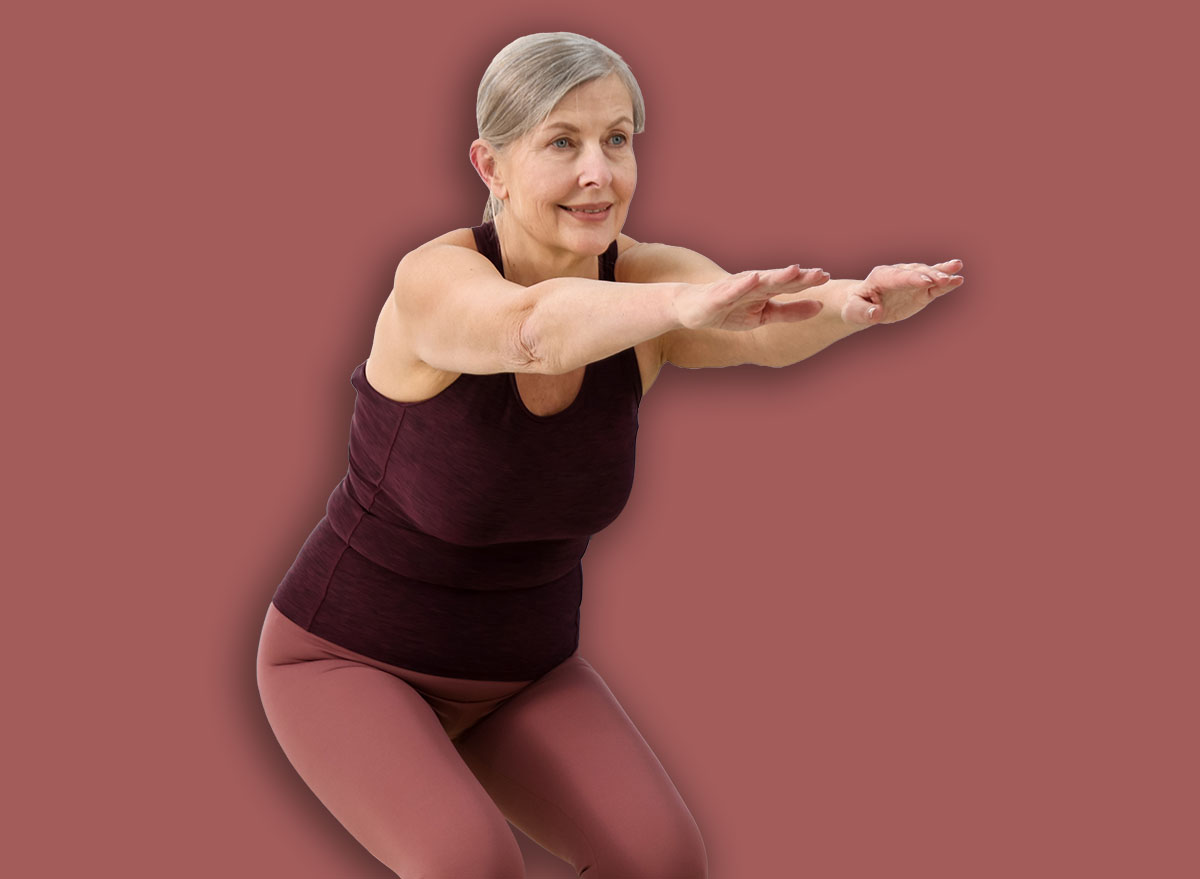 Senior woman exercising on mat at home. Fitness and sport