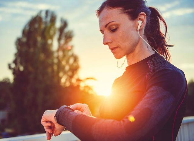Woman monitoring her progress on smart watch