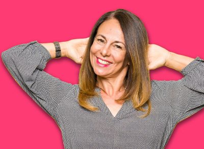 Beautiful middle age business woman Relaxing and stretching with arms and hands behind head and neck, smiling happy