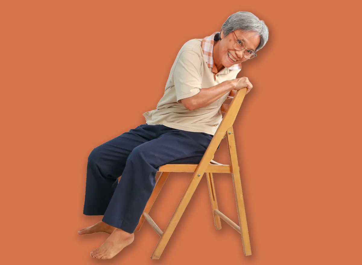 Healthy senior Asian women do exercises with chair, sport elderly lady practice yoga isolated on white background, Mature female warms up muscles, body flexibility and fitness lifestyle concept.