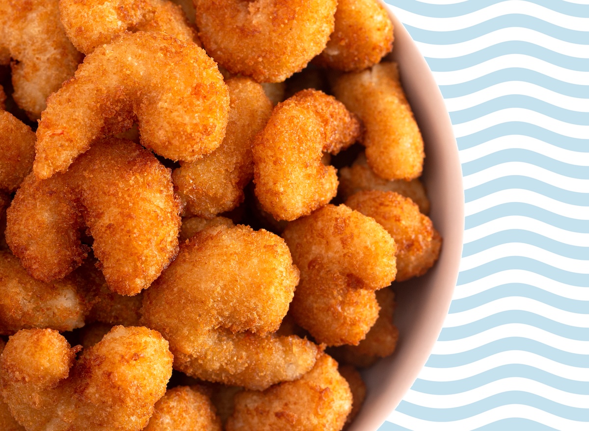 Popcorn shrimp=in bowl on wave background