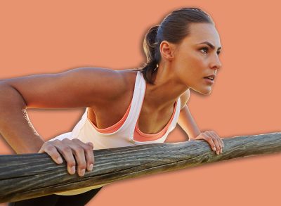 Fitness, woman and push ups at park for workout challenge, calisthenics training and strength. Person, practice and incline exercise for muscle development, health and wellness on fence with couple