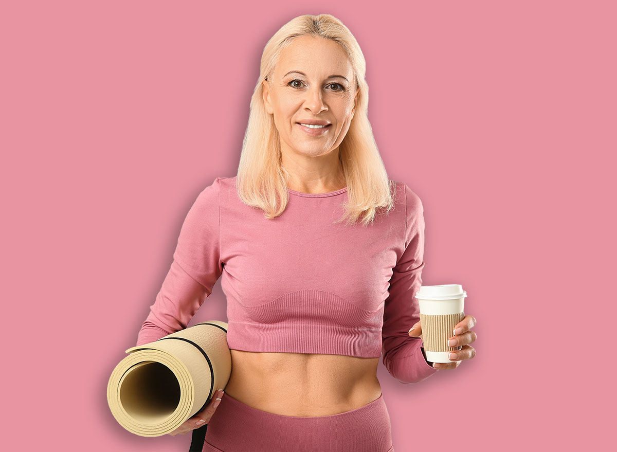 Mature woman in sportswear with cup of coffee and yoga mat on grey background