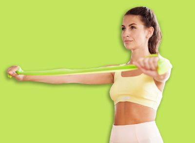 Uses sports equipment. Comfortable tight-fitting clothing for training. Slim figure cardio classes. A fitness trainer does exercises. A sporty woman and a healthy lifestyle.