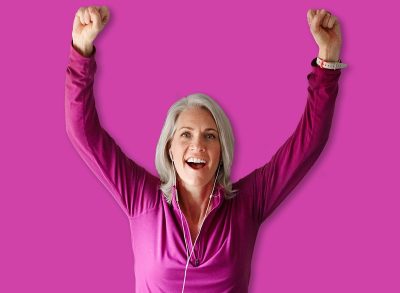 Gym, success or happy woman on cycling bike in workout or cardio training for progress, health or wellness. Class, exercise or proud senior person on bicycle machine for fitness, challenge or goal