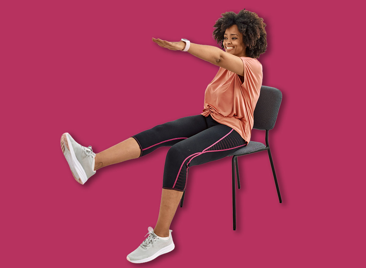 Young african american woman smiling confident stretching at sport center