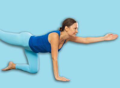 Mother, grandmother and adolescence son do exercise bird dog Dandayamana Bharmanasana Balancing Table pose. Concept of communication of generations, joint leisure