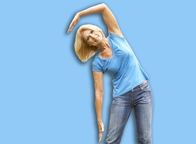 Senior Woman Exercising In Park