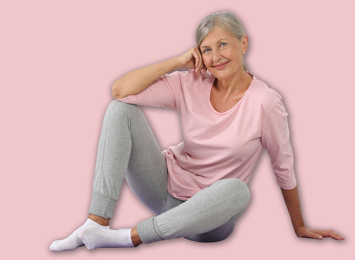 Happy,Senior,Woman,Sitting,On,Mat,At,Home.,Yoga,Practice