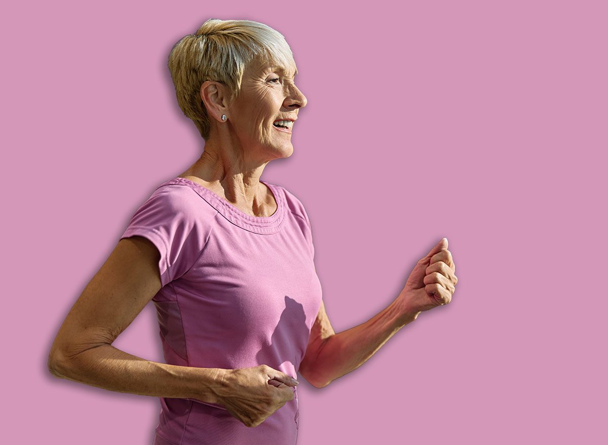 Portrait of a senior elderly woman exercising in a gym, running using threadmill machine equipment, healthy lifestyle and cardio exercise at fitness club concepts, vitality and active senior