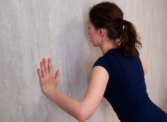 Girl push-ups from the wall