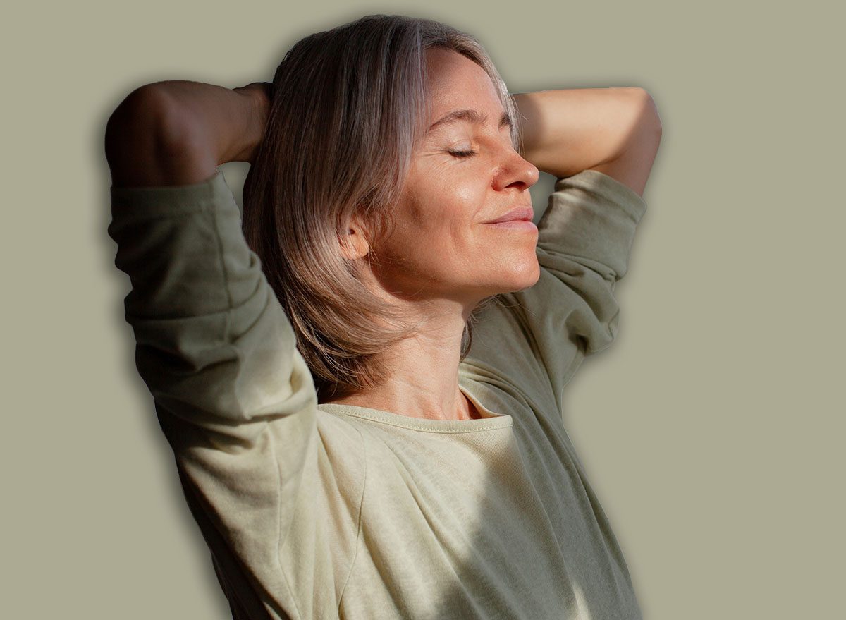 Beautiful,Middle,Age,Woman,Relaxing,With,Close,Eyes,And,Smile