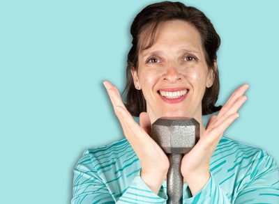 Older average looking woman doing a goblet squat. Happy and healthy active lifestyle concept image.