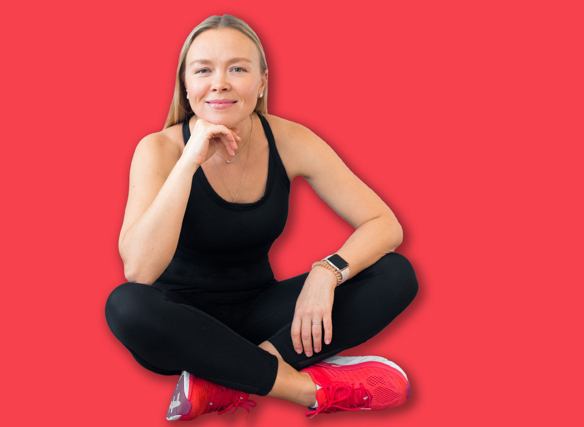woman doing fitness exercise at home, sit on floor