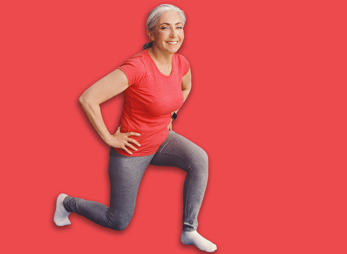Happy Senior Woman Doing Lunges At Home, Healthy Fitness Concept