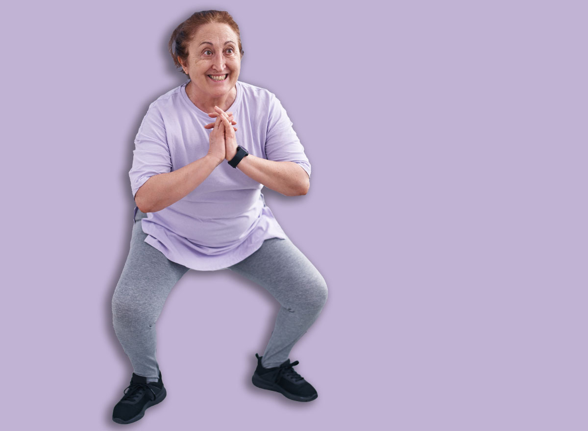 Senior woman smiling confident training at home