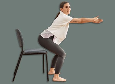 Young hispanic woman smiling confident stretching at sport center.
