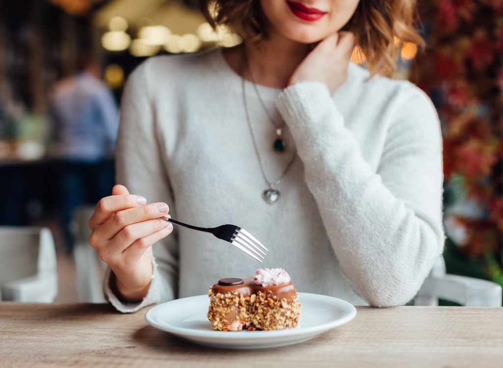 woman eating dessert