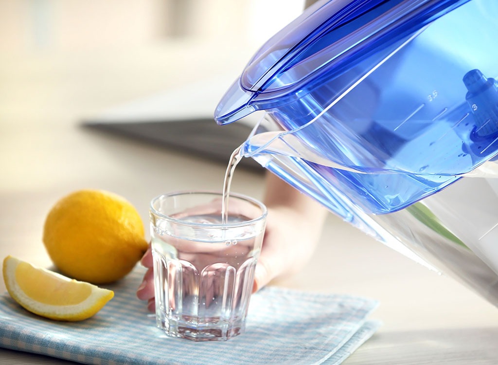 water pitcher pouring into glass