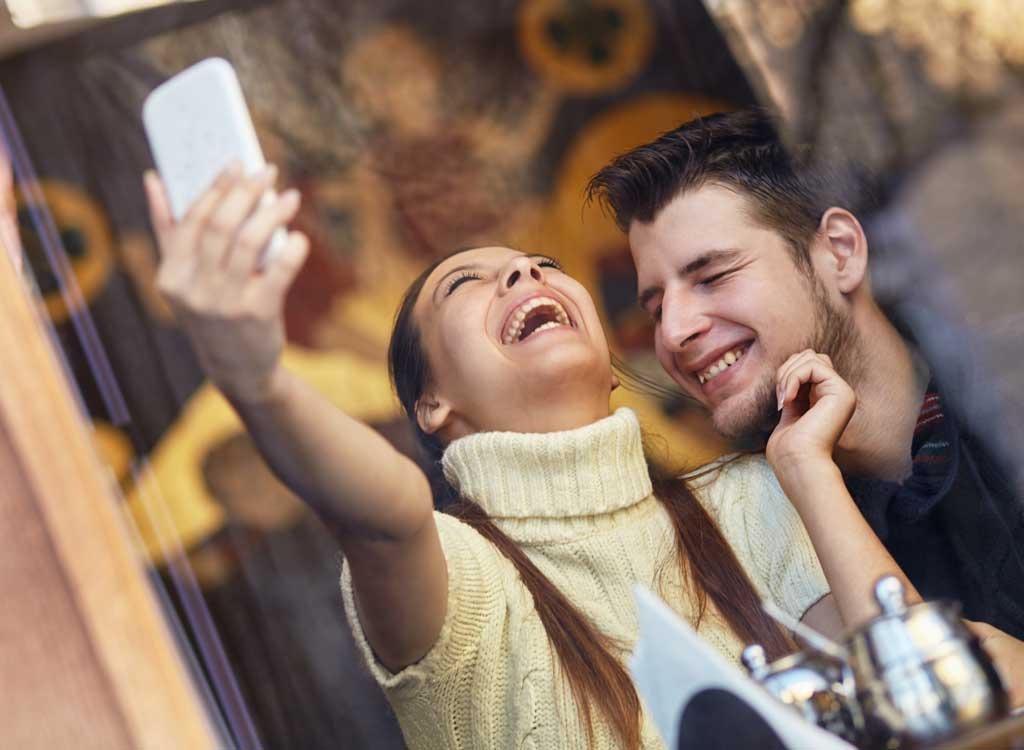 Couple taking selfie - how to lose weight after 30