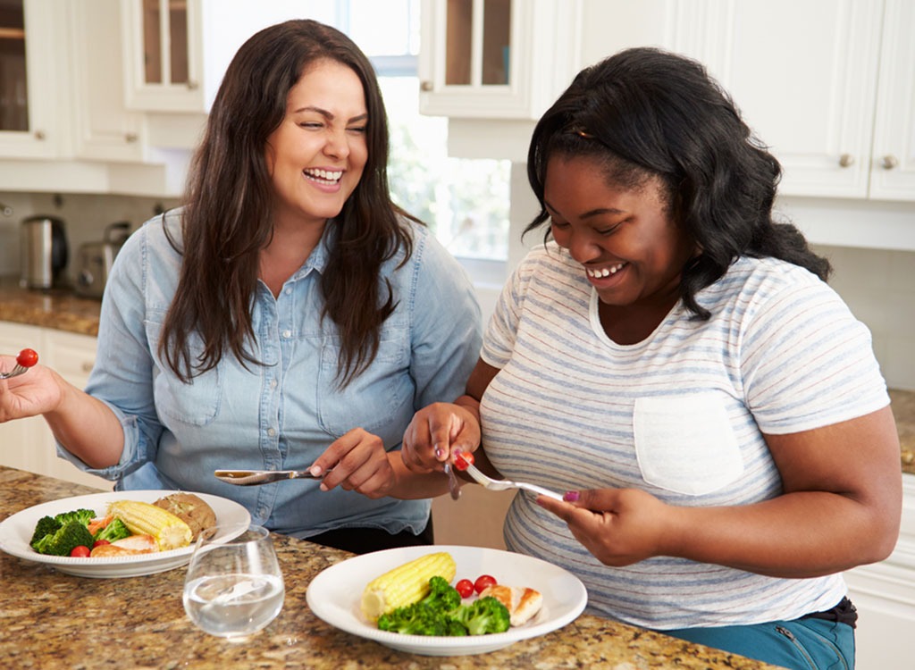 Overweight women eating