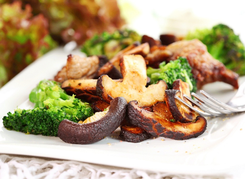 Roasted mushrooms and broccoli on a plate