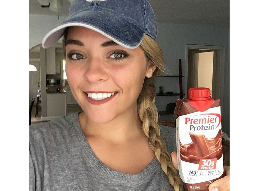 Haley J. Smith holding premier protein