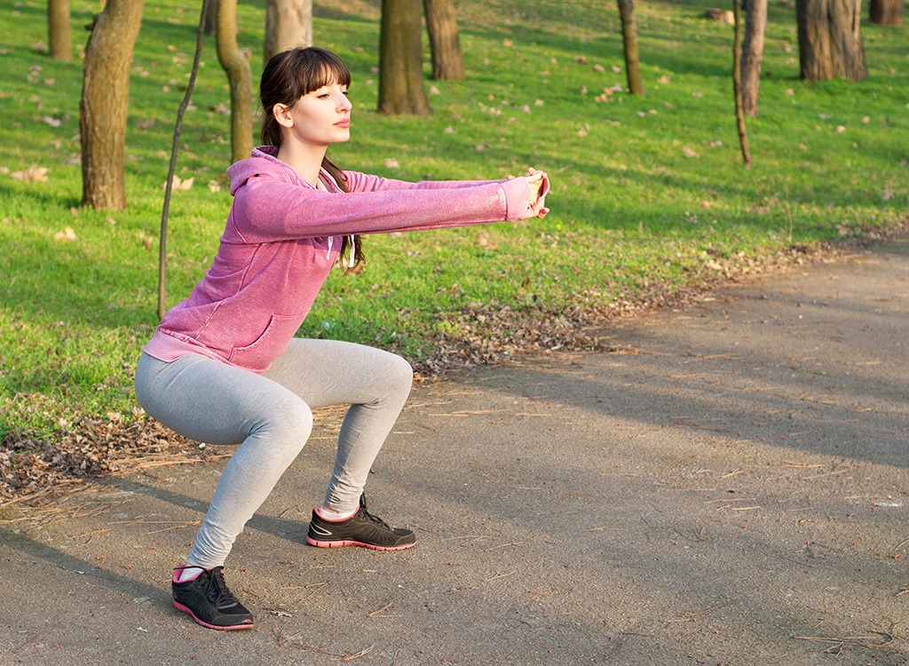 sumo squat in park