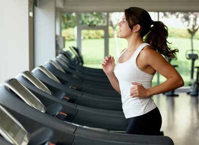 Woman running on treadmill