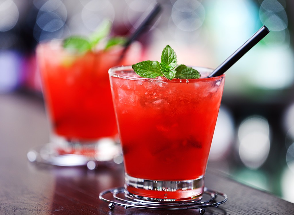 mai tai cocktail in glass with straw