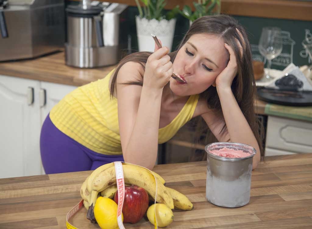 Yes, it's a stereotypical image: A woman comforting herself after a di...