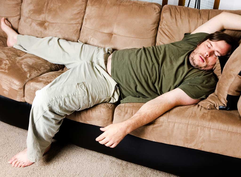 https://www.eatthis.com/wp-content/uploads/sites/4/media/images/ext/141087681/lazy-guy-on-couch.jpg