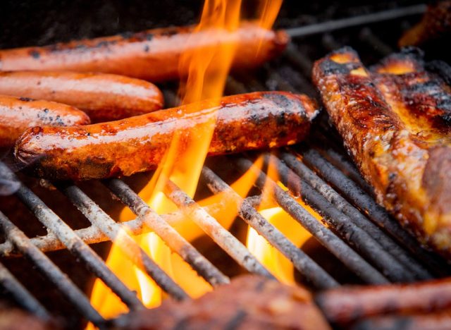 Sausage and hot dogs on grill