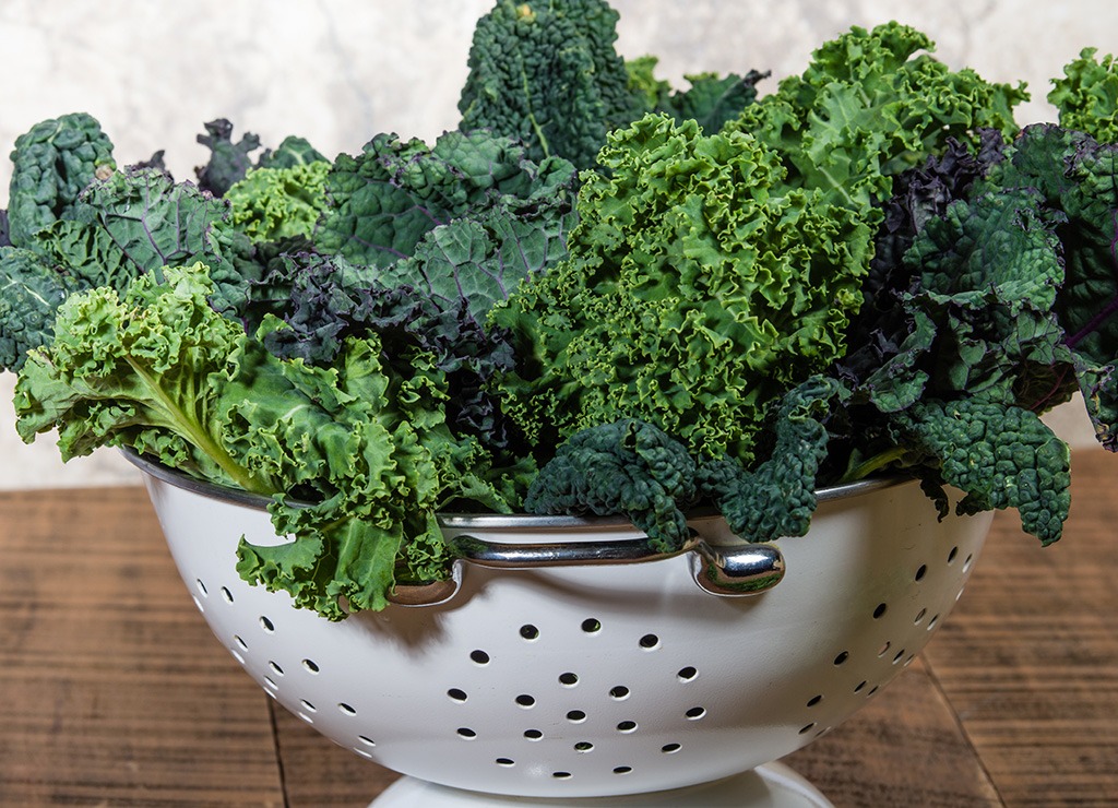 dark leafy greens of kale in colander