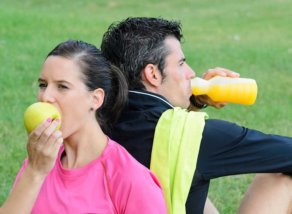sporty couple eating