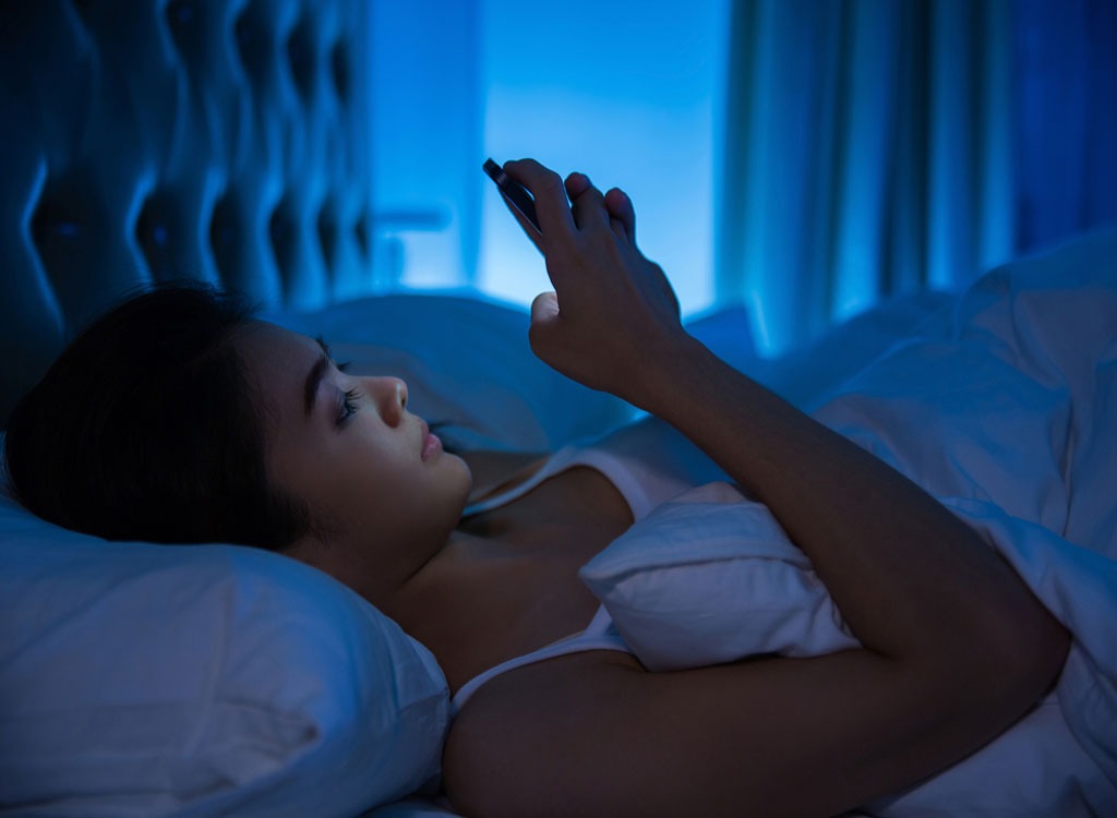 using phone in bed