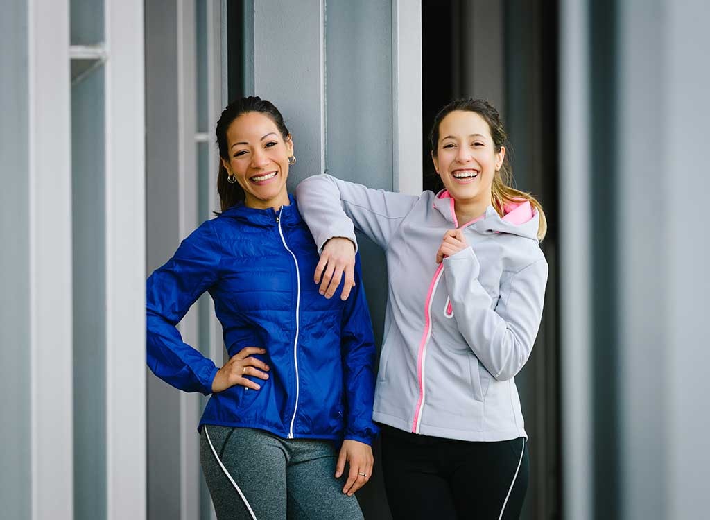 friends workout in coats